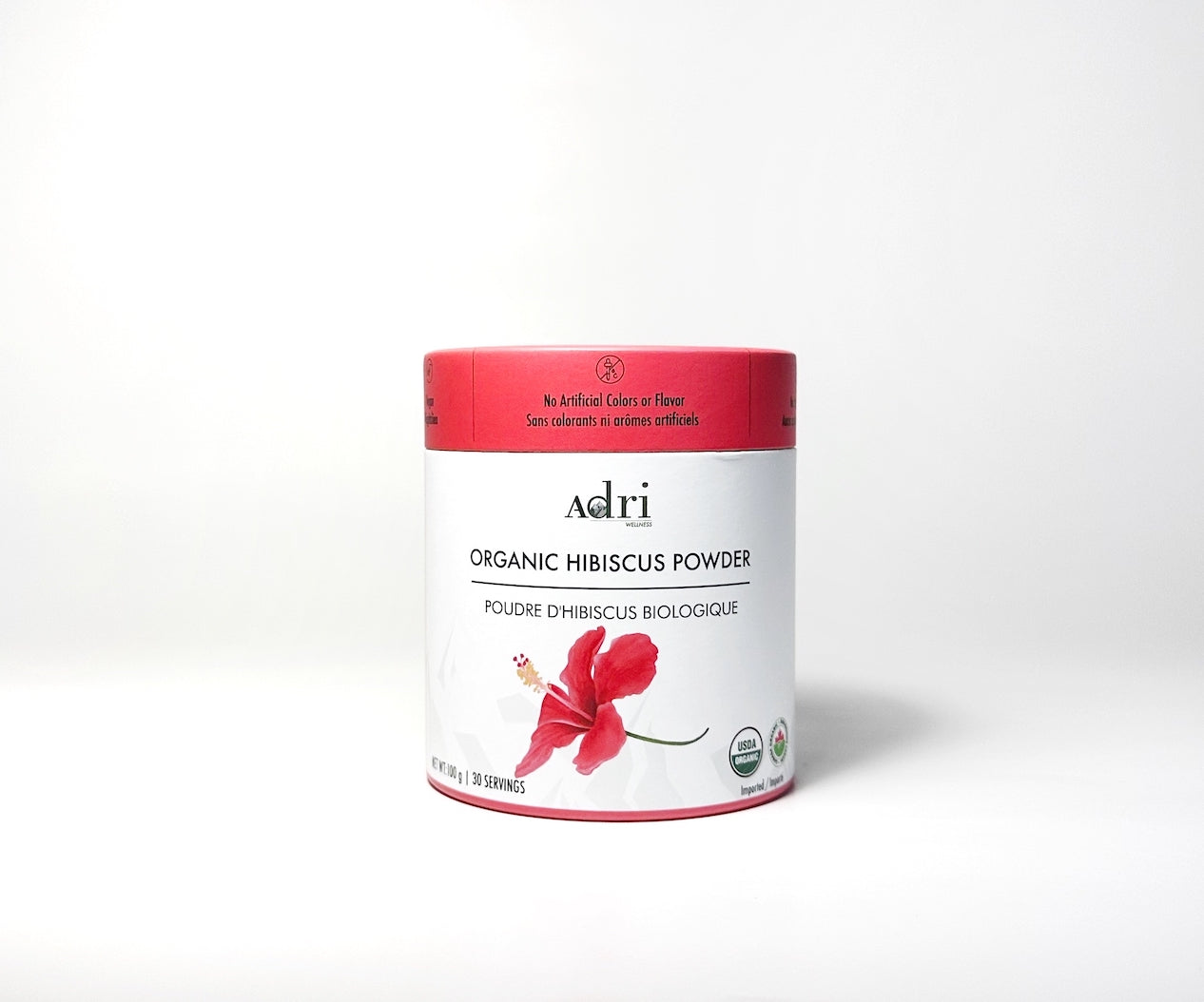 a 100gm sustainable paper tube container of Adri Wellness' organic Hibiscus powder against a white background