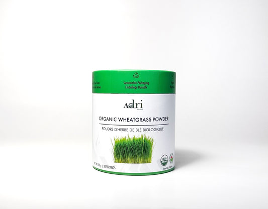 a 100 gm packaging of Adri Wellness' Organic Wheatgrass Powder