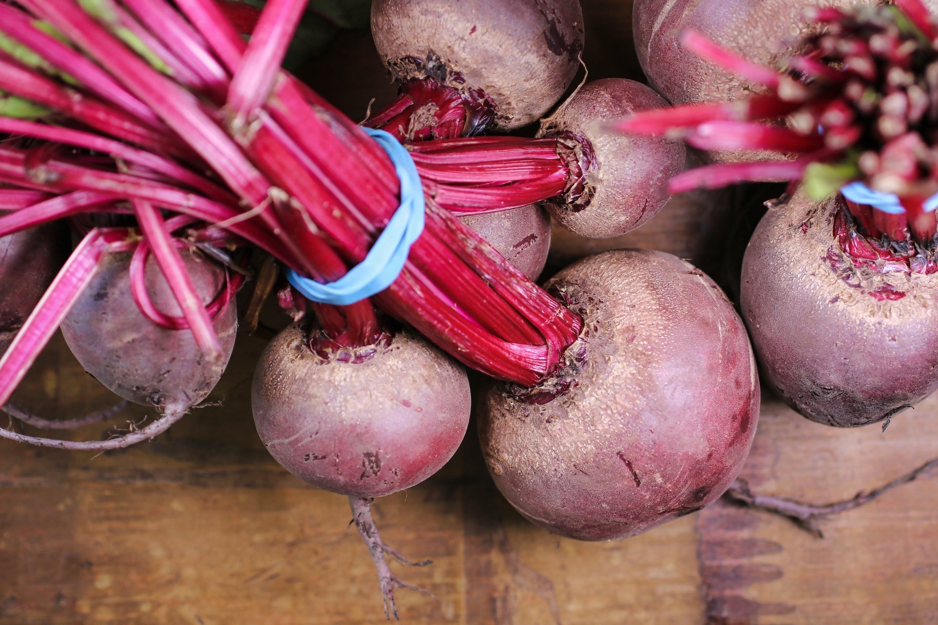 a bunch of raw beetroots tied together